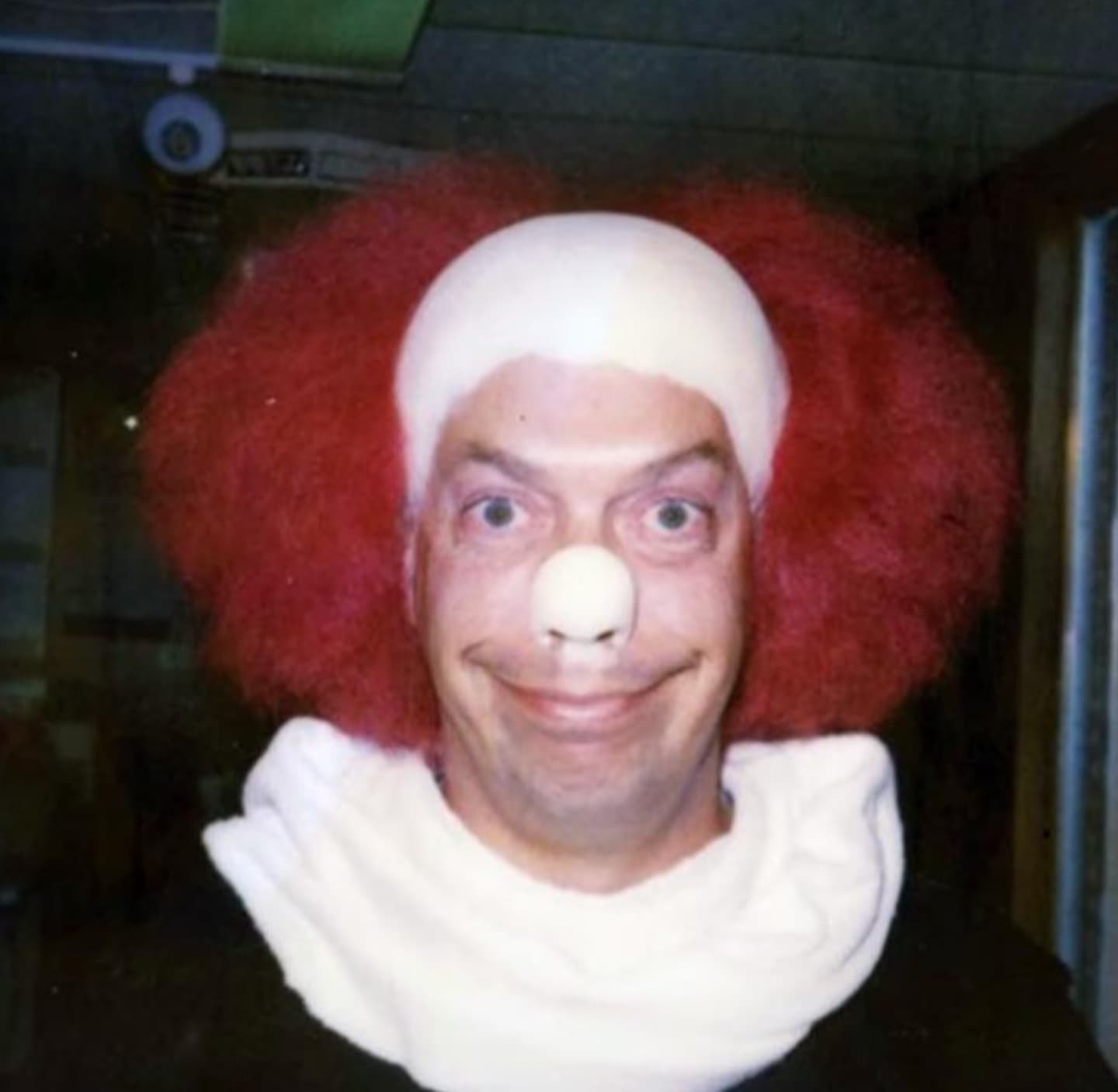 “Actor Tim Curry becoming Pennywise on the set of Stephen King's 'It’, 1990.”